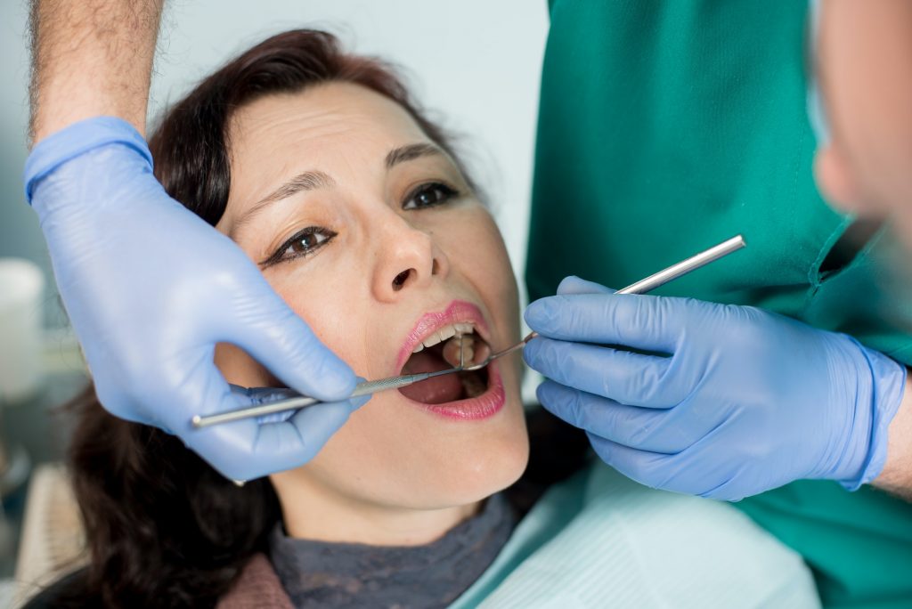 female having dental check up in dental clinic.
